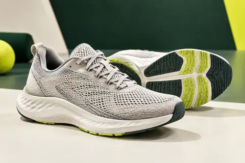 Chaussures de running Feethit pour homme en textile tricoté, avec lacets et semelle en EVA et caoutchouc.