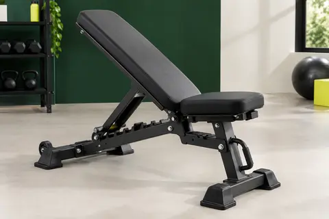 Banc de musculation réglable noir JOROTO avec dossier rembourré, cadre en acier et roues de déplacement.