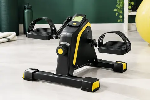 Mini vélo d’appartement noir et jaune avec pédales extra larges, molette de résistance et écran LCD éclairé